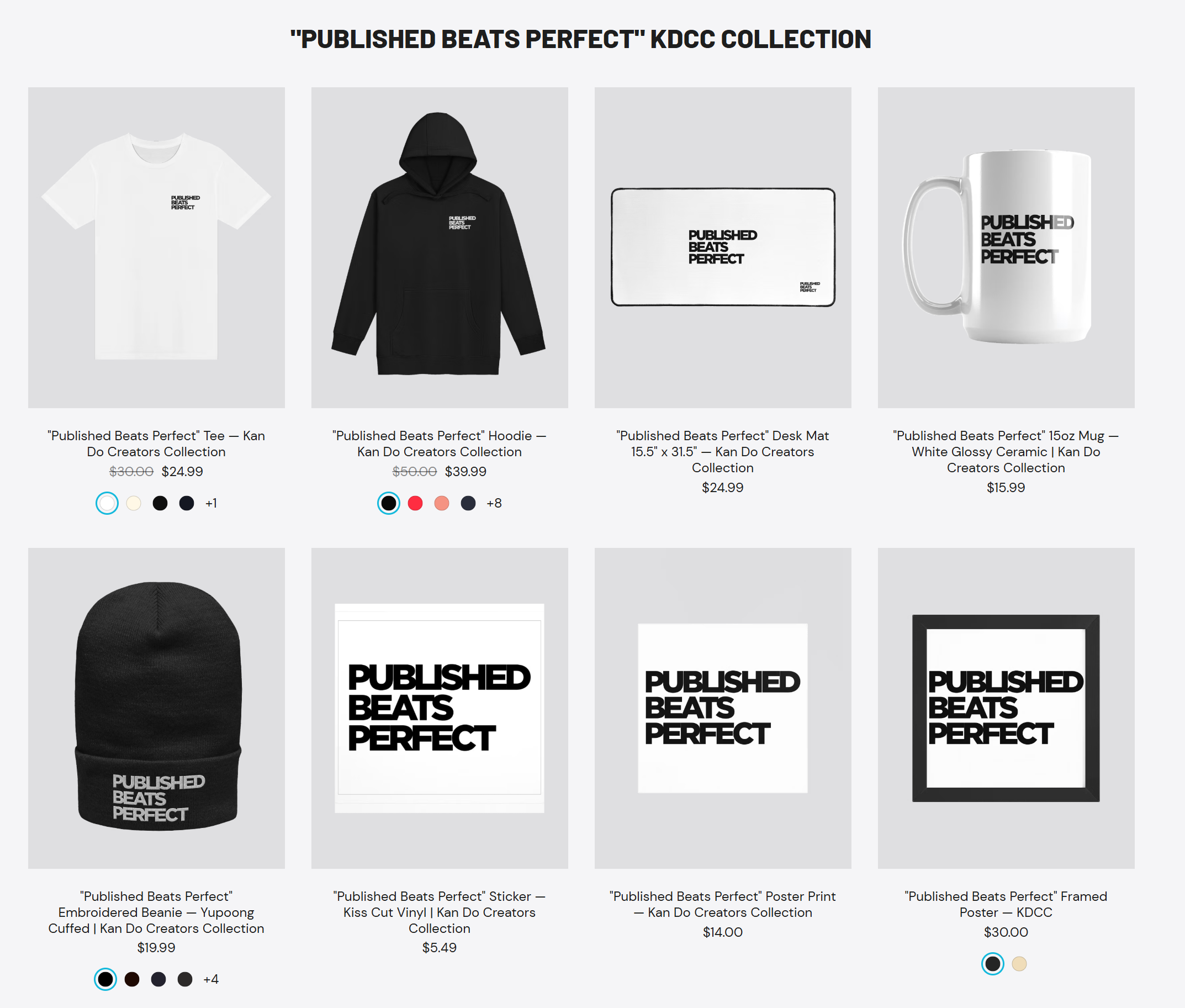Published Beats Perfect KDCC merch collection on Fourthwall featuring tees, hoodies, a desk mat, mug, beanie, sticker, and posters.