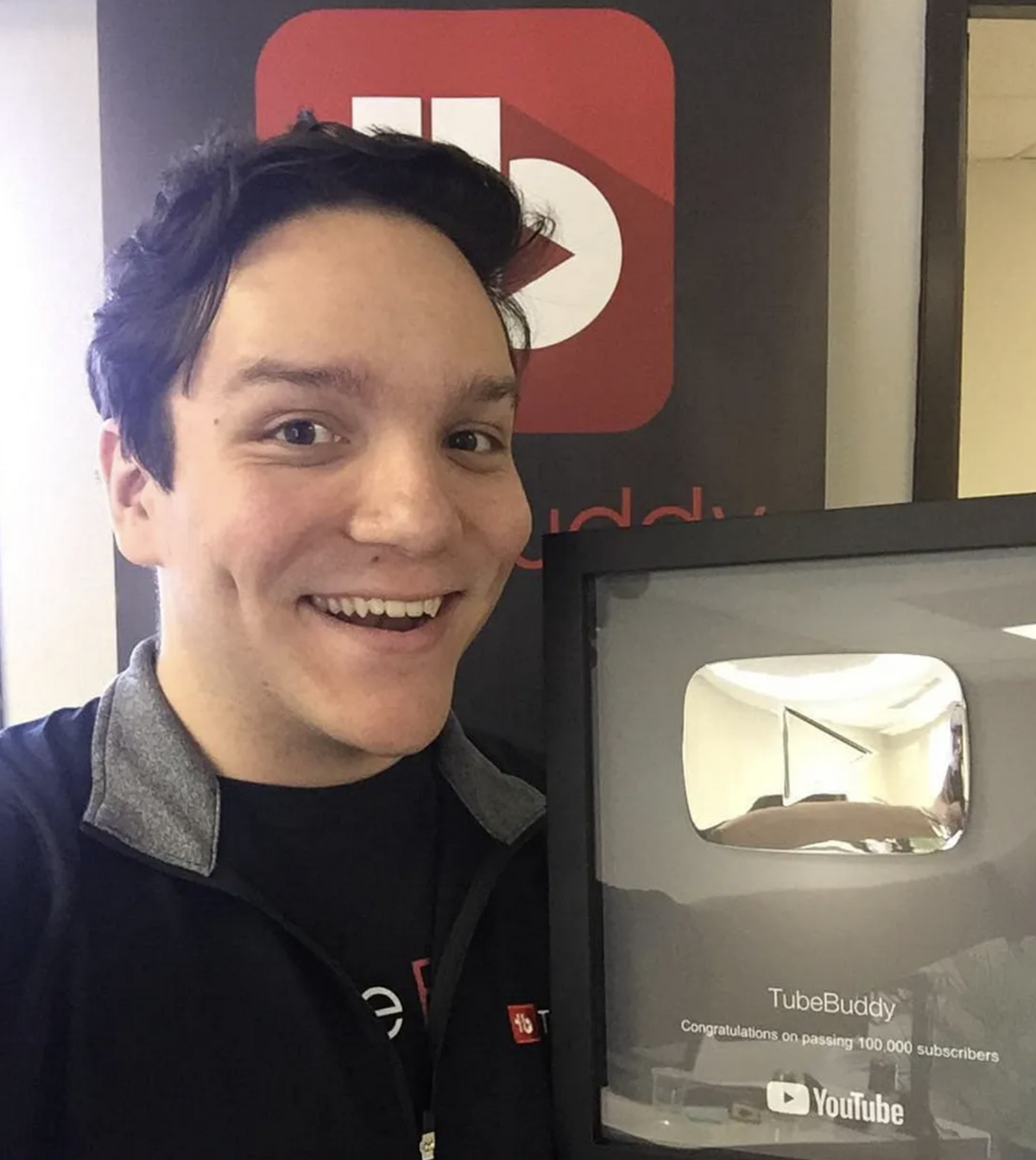 Andrew Kan with TubeBuddy's YouTube Silver Play Button award  he earned for reaching 100,000 subscribers
